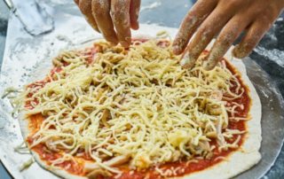 a pizza being made in York, Maine