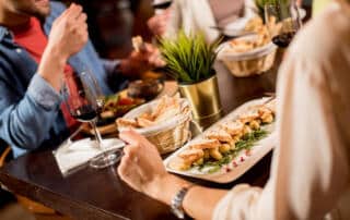 couple enjoying dinner at a restaurant in Westbrook Maine